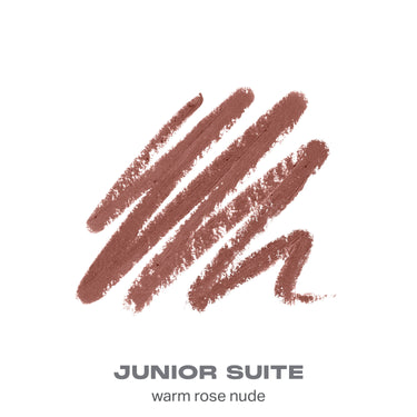{Junior Suite} Signature Lip Pencil shade swatch in warm rose nude with text "JUNIOR SUITE warm rose nude."