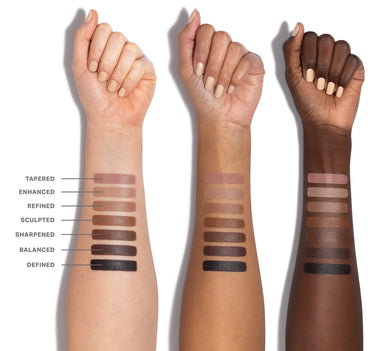 Shapelifter Micro Contour Stick arm swatches showing seven shades — TAPERED, ENHANCED, REFINED, SCULPTED, SHARPENED, BALANCED, DEFINED — on light, medium, and deep skin tones.