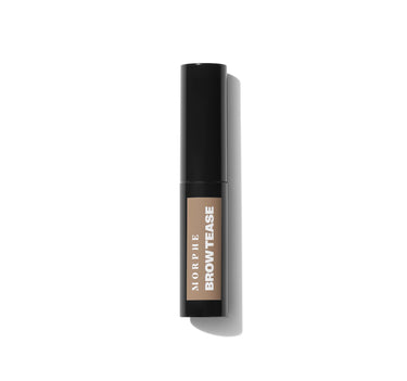 {Biscotti} Morphe Brow Tease Fiber-Infused Volumizing Mousse in Biscotti, closed black tube with tan label reading MORPHE BROW TEASE.