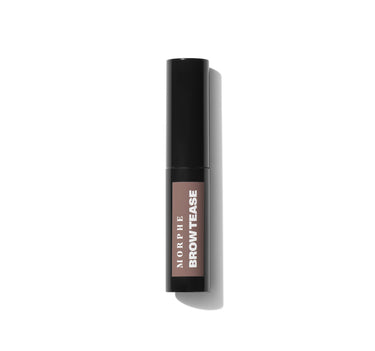 {Hazelnut} Morphe Brow Tease Fiber Infused Volumizing Mousse black cylindrical tube with taupe product window labeled MORPHE BROW TEASE, on white background
