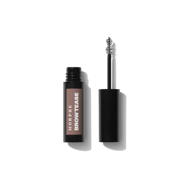 {Hazelnut} Morphe Brow Tease Fiber Infused Volumizing Mousse in a black tube with taupe label reading "MORPHE BROWTEASE," shown open with spoolie wand.
