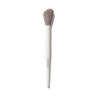 Morphe M201 Angled Powder Blush Brush with cream handle printed MORPHE and tapered gray bristles, shown on white background. | M201 Angled Powder Blush Brush