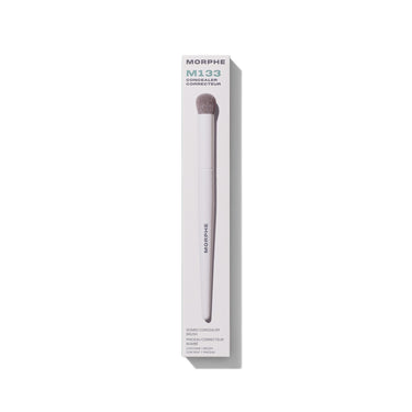 Morphe M133 Domed Concealer Brush in white box labeled "MORPHE M133 CONCEALER CORRECTEUR DOMED CONCEALER BRUSH PINCEAU CORRECTEUR BOMBÉ CONTAINS 1 BRUSH CONTIENT 1 PINCEAU," lavender handle with taupe bristles. | M133 Domed Concealer Brush | Secondary image