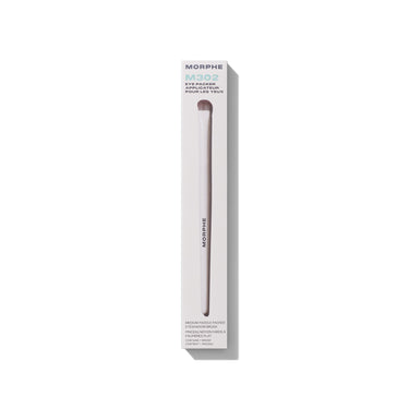 M302 Medium Paddle Packer Eyeshadow Brush shown beside its cream MORPHE retail box for lid color payoff. | M302 Medium Paddle Packer Eyeshadow Brush | Secondary image
