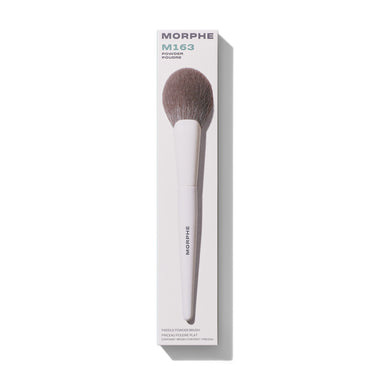 Morphe M163 Paddle Powder Brush in white packaging labeled "MORPHE M163 POWDER POUDRE PADDLE POWDER BRUSH PINCEAU POUDRE PLAT CONTAINS 1 BRUSH/CONTIENT 1 PINCEAU." | M163 Paddle Powder Brush | Secondary image
