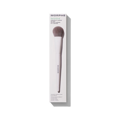 Morphe M204 Rounded Cream & Liquid Blush Brush in white box packaging labeled "MORPHE M204 Cream & Liquid Blush / Blush Crème et Liquide," with white handle and taupe dome bristles.
