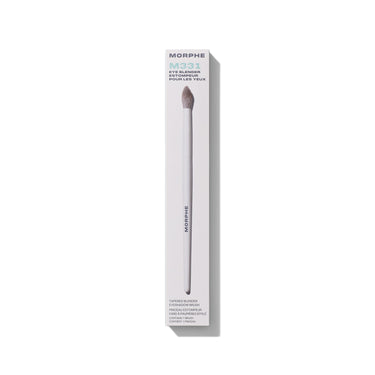 M331 Tapered Blender Eyeshadow Brush shown beside its cream MORPHE retail box for crease and blend application. | M331 Tapered Blender Eyeshadow Brush | Secondary image