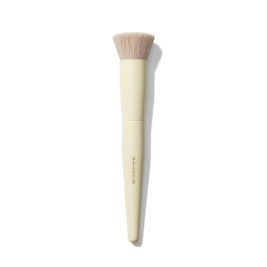 Morphe Buttery Blends M106 Flat-Topped Foundation Brush with soft tapered bristles and cream handle stamped "MORPHE." | Buttery Blends M106 Flat-Topped Foundation Brush