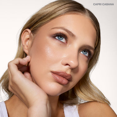 {Capri Cabana} Cheek Thrills Bronze Tone Duos on-figure model wearing shade CAPRI CABANA with a sun-kissed bronze glow.