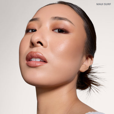 {Maui Surf} Model wearing Morphe Cheek Thrills Bronze Tone Duos in shade MAUI SURF, showcasing sun-kissed bronzed skin with a radiant glow.