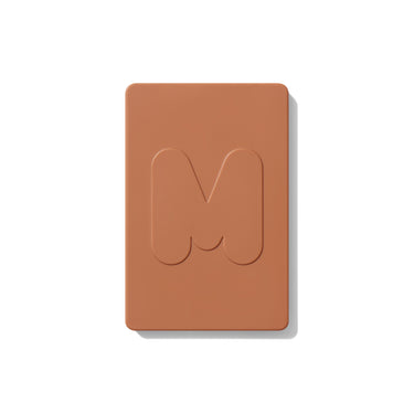 {Tulum Trip} Cheek Thrills Bronze Tone Duos closed compact with embossed Morphe M logo on warm terra-cotta lid.