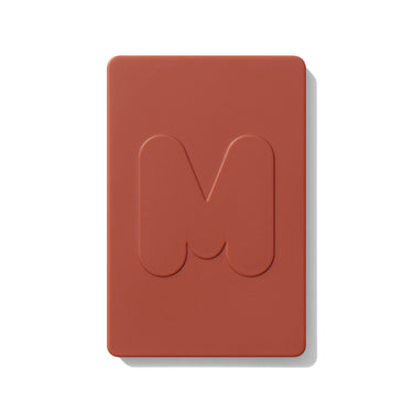 {Private Island} Cheek Thrills Multi-Finish Face Trio closed compact in terracotta with embossed Morphe M logo on the lid.