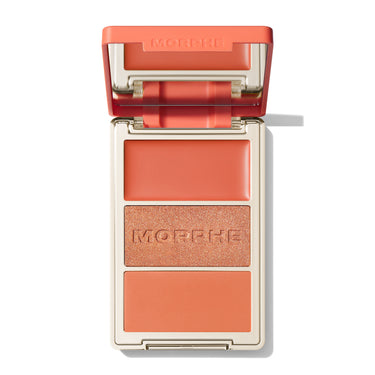 {Poolside Spritz} Open Morphe Cheek Thrills Multi-Finish Face Trio with coral lid, coral cream, peach shimmer with MORPHE engraved, coral matte.