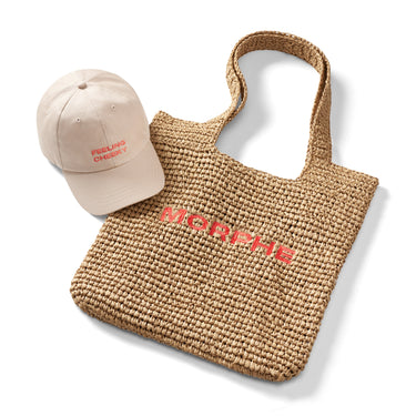 Morphe Dad Hat and raffia tote bag styled together as a gift-with-purchase set.
