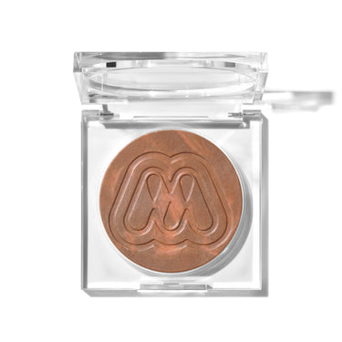 {Sunset} Morphe Cloudlight Soft Glow Veil open clear compact showing warm bronze shimmer powder with embossed M logo.