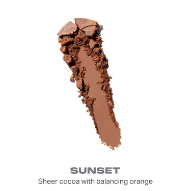 {Sunset} Swatch of Cloudlight Soft Glow Veil powder in Sunset — SUNSET, Sheer cocoa with balancing orange.