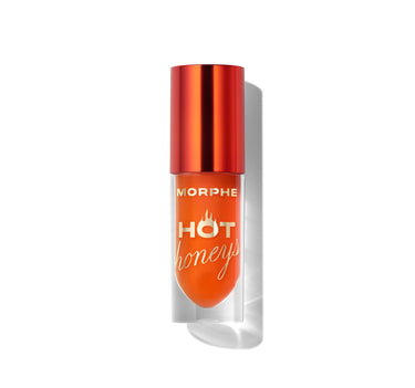 {Heat Swarm} Morphe Hot Honeys Plumping Lip Oil in bright orange with red-orange cap, labeled MORPHE HOT honeys with flame icon.