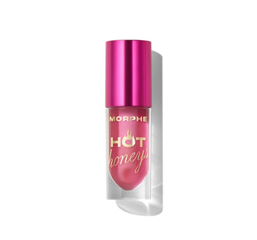 {Hive Mentality} Morphe Hot Honeys Plumping Lip Oil in a clear tube with magenta oil and metallic pink cap, labeled MORPHE HOT honeys in gold.
