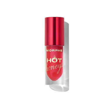 {Queen Bee} Morphe Hot Honeys Plumping Lip Oil closed tube with red metallic cap and clear teardrop window showing hot-pink oil, labeled "MORPHE HOT honeys."