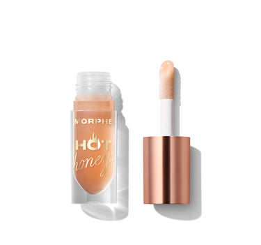 {Royal Sting} Morphe Hot Honeys Plumping Lip Oil open, clear bottle labeled "MORPHE HOT honeys" filled with peachy-honey oil beside rose gold cap with applicator wand. | Hot Honeys Plumping Lip Oil