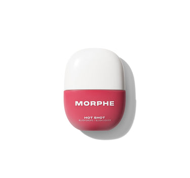 {Fireball} Morphe Hot Shot Blush Drops closed bottle in coral-pink with white cap, labeled MORPHE / HOT SHOT / BLUSH DROPS / BLUSH LIQUIDE.