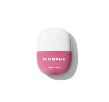 {Flex Symbol} Closed pink and white domed Morphe Hot Shot Blush Drops labeled MORPHE, HOT SHOT, BLUSH DROPS / BLUSH LIQUIDE.