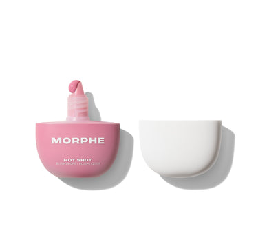 {That Girl} Morphe Hot Shot Blush Drops / Blush Liquide open dome-shaped pink bottle with dropper and white cap beside it.