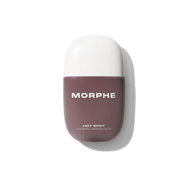 {Rich Beach} Morphe Hot Shot Sun Drops / Bronzer Liquide liquid bronzer in a mauve bottle with white cap, labeled MORPHE / HOT SHOT / SUN DROPS / BRONZER LIQUIDE.