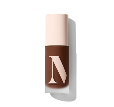 {Deep 35W} Cylindrical Morphe Lightform Extended Hydration Foundation bottle with cream cap and deep brown body displaying the M logo.