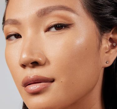 {Light 07W} Model closeup showcasing Lightform Extended Hydration Foundation in shade Light 07W with a luminous, dewy finish on complexion.