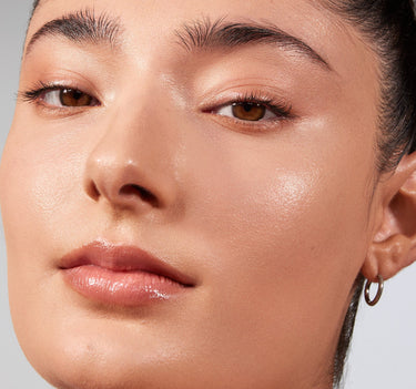 {Medium 08N} Close-up of model wearing Lightform Extended Hydration Foundation in Medium 08N with a dewy, luminous, natural-coverage finish.
