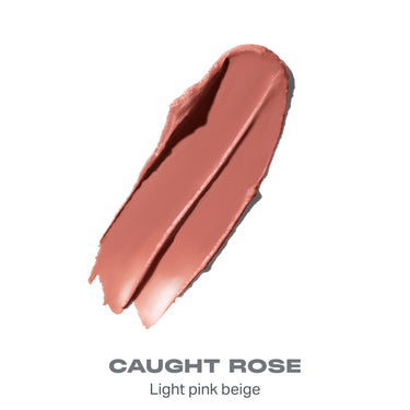 {Caught Rose} Liplock Glossy Lipstick shade swatch in CAUGHT ROSE — Light pink beige.