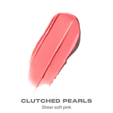 {Clutched Pearls} Liplock Glossy Lipstick shade swatch in sheer soft pink with text "CLUTCHED PEARLS Sheer soft pink."