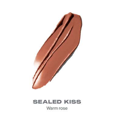 {Sealed Kiss} Liplock Glossy Lipstick shade swatch in warm rose with text "SEALED KISS Warm rose."