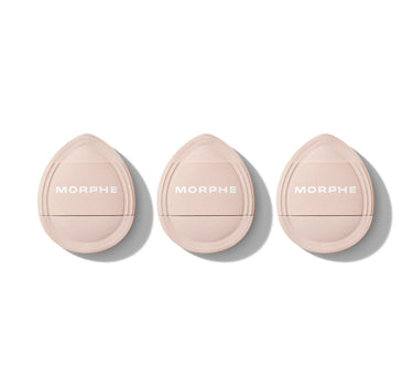 Three nude Cloud Cushion Mini Puff Trio applicators with MORPHE branding displayed in a row on a white background. | Cloud Cushion Mini Puff Trio