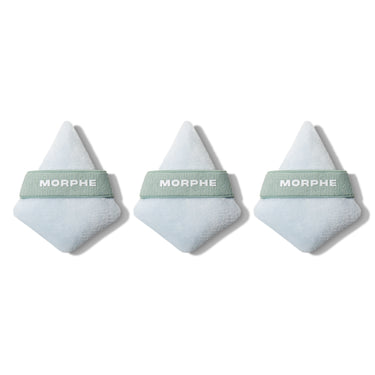 To The Point Mini Powder Puff Trio featuring three white triangular powder puffs with sage green MORPHE bands on a white background. | To The Point Mini Powder Puff Trio