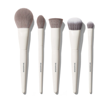 Morphe Portrait Mode 5 Piece Face Brush Set featuring five gray-bristled brushes on cream handles each labeled MORPHE, arranged by size. | Portrait Mode 5-Piece Face Brush Set