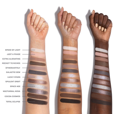 {Moon Stone} Chromaplus 12 Pan Eyeshadow Palette swatches on three skin tones: Speed of Light, Just a Phase, Extra Alienating, Rocket to Riches, Otherearthly, Galactic Gem, Lucky Stars, Opulent Orbit, Space Age, Nocturnal Nova, Cocoa Cosmos, Total Eclipse.