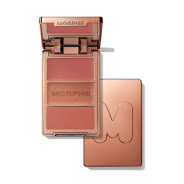 Cheek Thrills Multi-Finish Face Trio Yacht Day open compact showing matte blush, MORPHE-engraved shimmer highlight, and satin bronzer pan, with rose-gold lid engraved MORPHE and closed compact beside it.