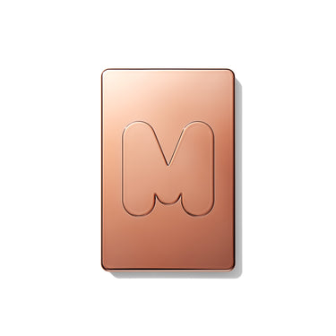 {Yacht Day} Cheek Thrills Multi-Finish Face Trio closed compact with rose-gold lid engraved with the Morphe M logo.