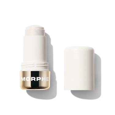 {Over Ice} Morphe Dreamlight Gelee Highlighter Stick in Over Ice, open stick beside cap showing icy pearl shimmer bullet with gold MORPHE band. | Dreamlight Gelée Highlighter Stick