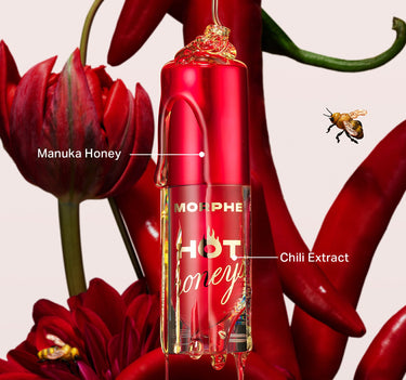 {Royal Sting} Morphe Hot Honeys Plumping Lip Oil red bottle labeled "MORPHE HOT honeys" with callouts for Manuka Honey and Chili Extract, surrounded by red flowers, chili peppers, and a bee.