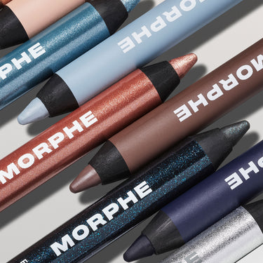 Morphe Bi Liner Dual Ended Gel Liners shown on figure in shades including blue, lavender, rose gold, bronze, navy, and silver shimmer, each stamped with MORPHE.