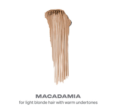 {Macadamia} Brow Tease Fiber Infused Volumizing Mousse swatch in shade MACADAMIA for light blonde hair with warm undertones, showing vertical fiber texture.