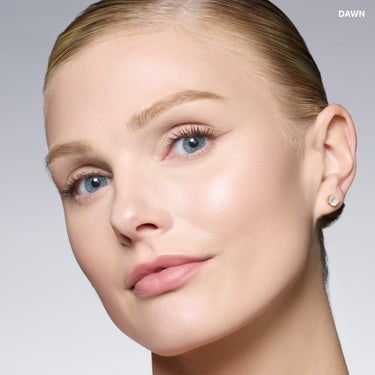 {Dawn} Model wearing Cloudlight Soft Glow Veil in DAWN with a luminous, soft-glow complexion finish.