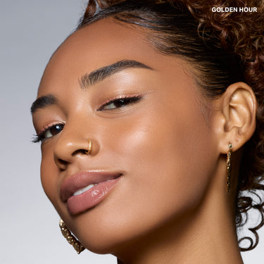{Golden Hour} Model wearing Cloudlight Soft Glow Veil in Golden Hour, showing luminous dewy finish with soft-focus skin radiance.