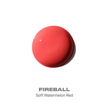 {Fireball} Smear of Hot Shot Blush Drops in FIREBALL Soft Watermelon Red, a glossy coral-red drop-shaped swatch on white.