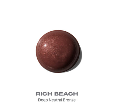 {Rich Beach} Hot Shot Sun Drops deep bronze shimmery liquid smear labeled RICH BEACH, Deep Neutral Bronze on white background.