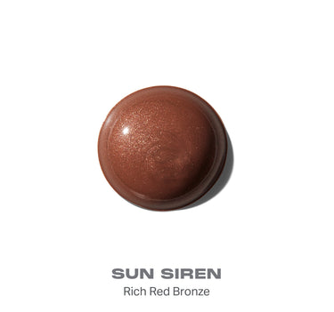 {Sun Siren} Morphe Hot Shot Sun Drops smear swatch in SUN SIREN Rich Red Bronze, shimmery deep red-bronze liquid on white background.