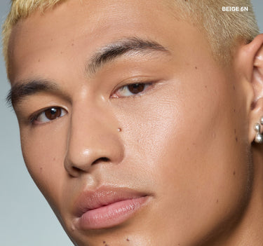 {Beige 6n} Wakeup Artist Under Eye Correcting Concealer in BEIGE 6N worn on a model showing smooth, brightened under-eye coverage.